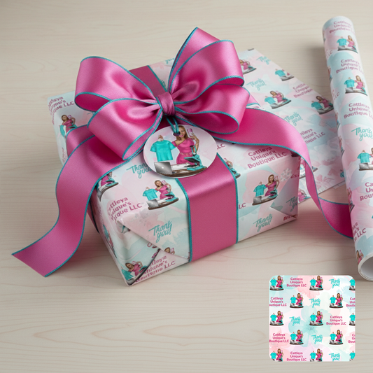 Gift box with pink ribbon, matching wrapping paper, and card on a light background for a business Cattleya Unique's Boutique LLC